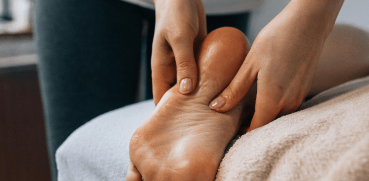 applying a cream for diabetic foot pain
